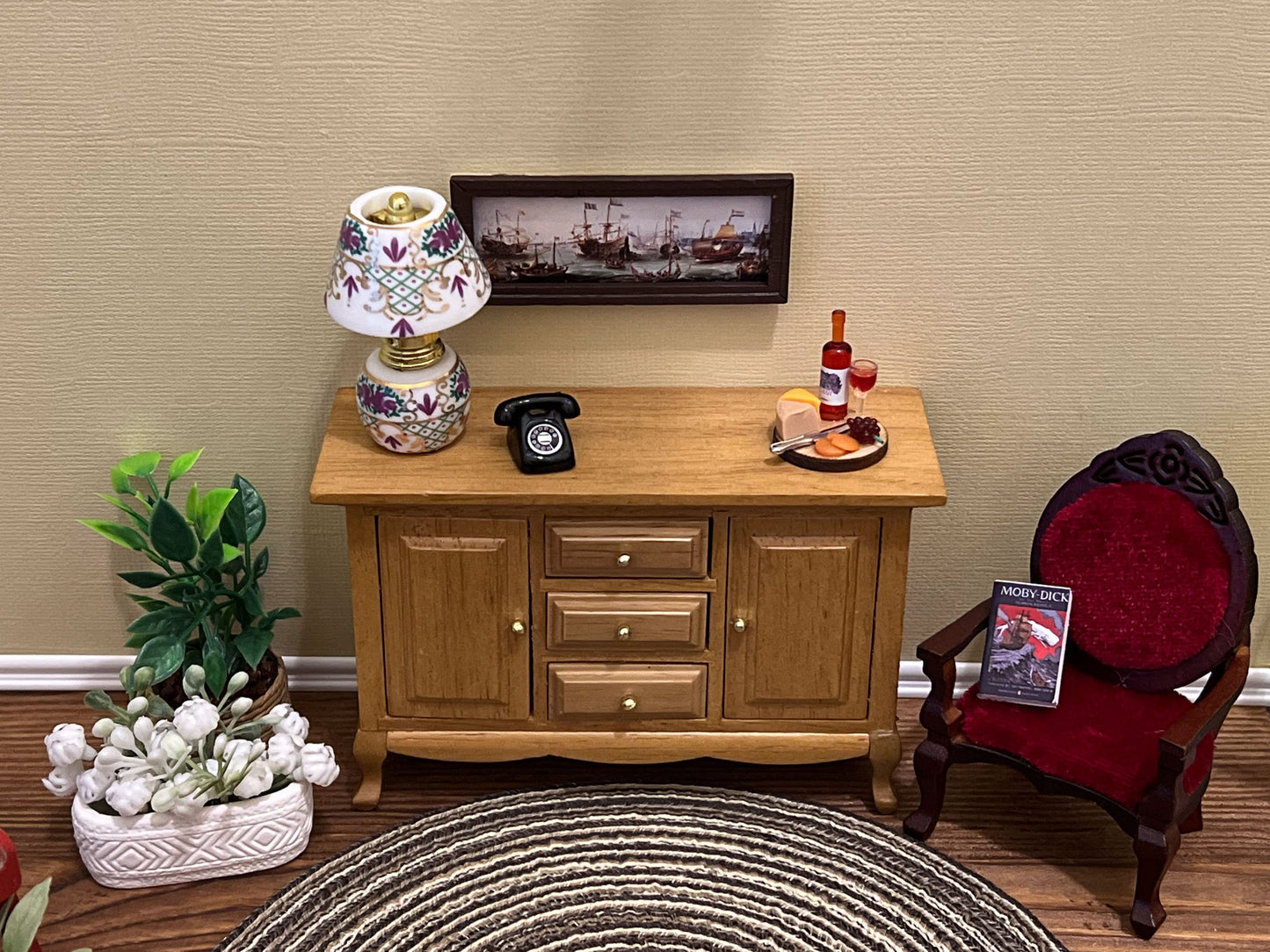 This adorable sturdy dresser comes in a light oak finish, has 3 drawers and 2 doors that can all be opened, accented with golden knobs. The craftmanship is outstanding! Use it for storage of your dishes or clothes, the uses are endless. __etsy:5743912044