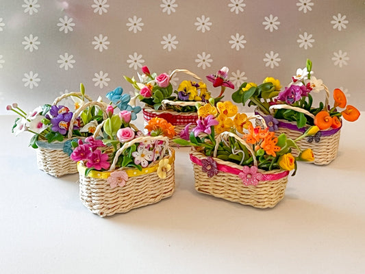 This handcrafted wicker basket is absolutely beautiful. The basket is decorated with satin lace, cute paper flowers to compliment the look, and with 4 bunches of polymer clay beautiful colorful flowers for a realistic easter basket look. __etsy:6302343487
