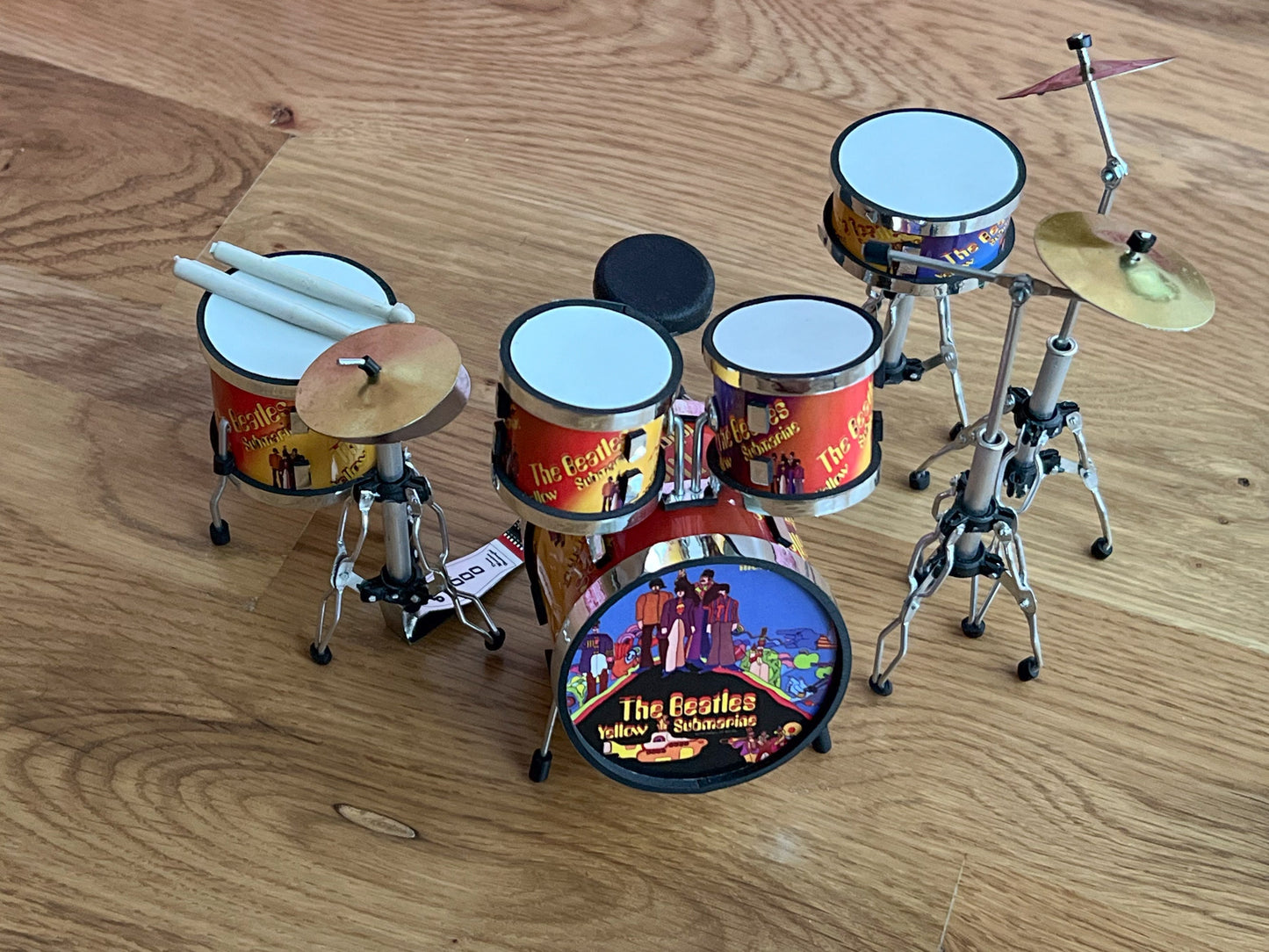 This beautiful, handcrafted Beatles Yellow Submarine Album Cover replica drum set is astonishing to the most precise details. 
This drum set will bring a blast from the past to music lovers! __etsy:6169703697