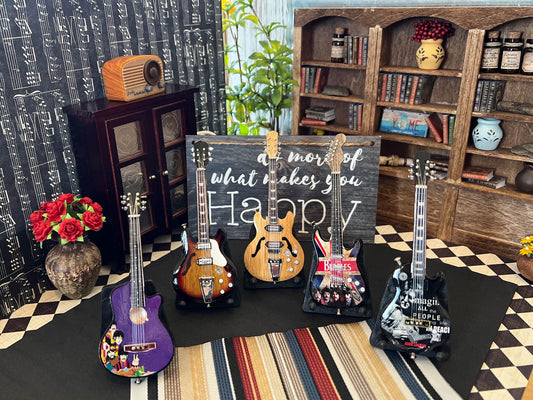 These Beatles acoustic and electric guitars are beautiful and perfectly made; they are outstandingly realistic! They have a gloss front and back finish and mahogany or beige neck.
Designed for 1:12 scale. __etsy:6622187973