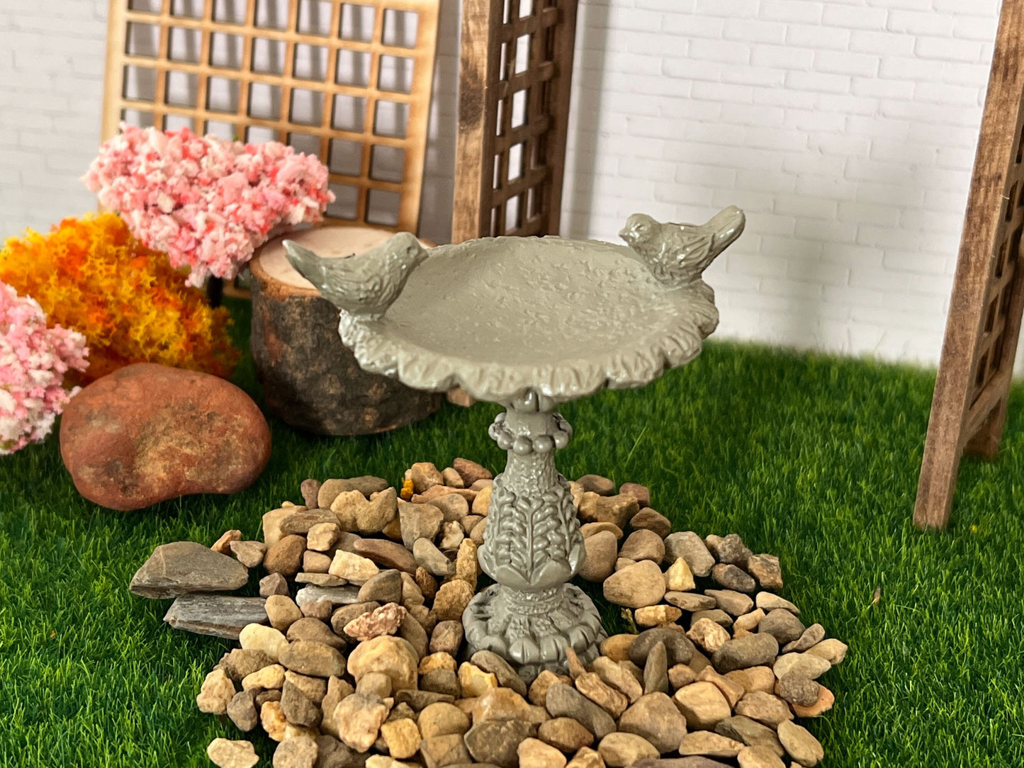 This doll house miniature decorative bird bath is adorable, is made of clay in a grey tone with an intricate design at the base. It is a stylish old school design with two birds' accent on each side. __etsy:5983948980