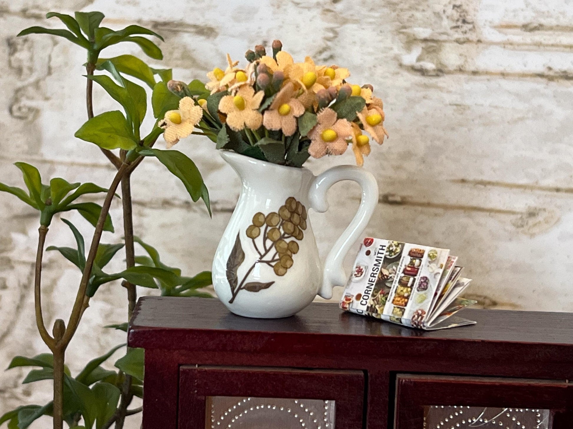 ✨ A Charming Ceramic Centerpiece for Your Dollhouse!
This adorable white ceramic centerpiece adds elegance and realism to your dollhouse. Handcrafted with a beautiful floral design on the front, this piece is perfect for creating a warm and inviting miniature space. Whether placed on a dining table, shelf, or mantel, it will make a statement in any setting. Simply add tiny flowers, and your little home will instantly feel more lifelike!

🌿 Pleas __etsy:6707749002