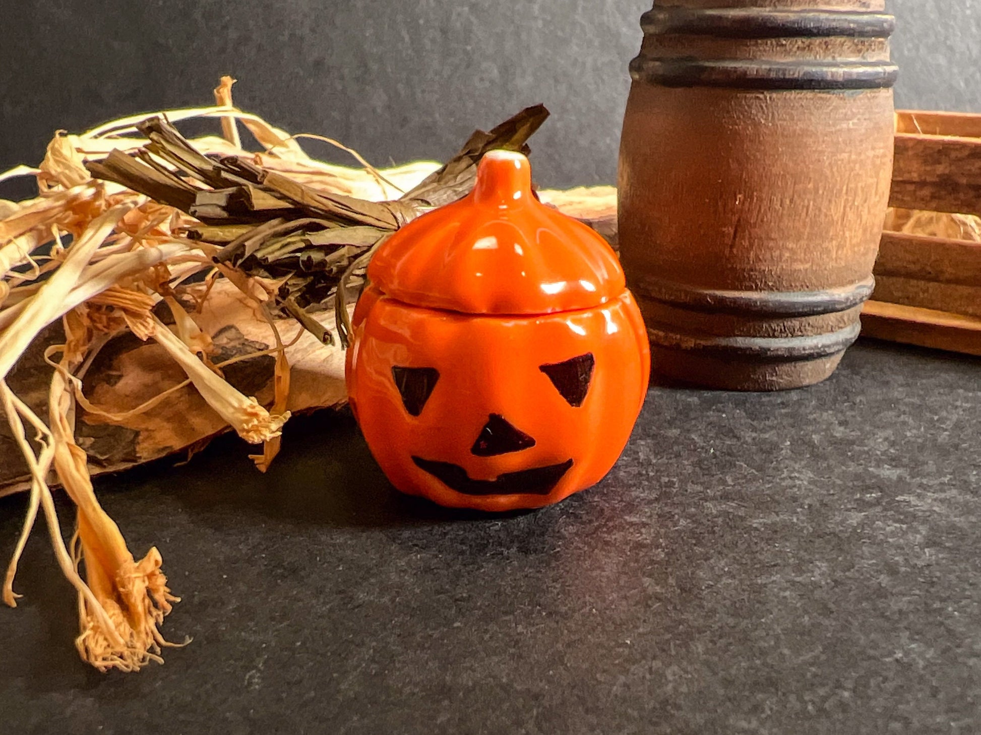 Miniature pumpkins with little ghost face and a lid that opens. These are ceramic and created to perfection. You can choose from hollow face or painted in black face.

Perfect for tabletop decoration, Halloween dollhouse outside decor. __etsy:5452156087