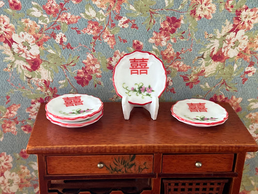 These dollhouse Chinese Double Happiness plates are absolutely adorable; the craftmanship is to perfection. They come in white with red trim, and the double happiness words are in red with a beautiful pink flower design below the letters. __etsy:6046186521