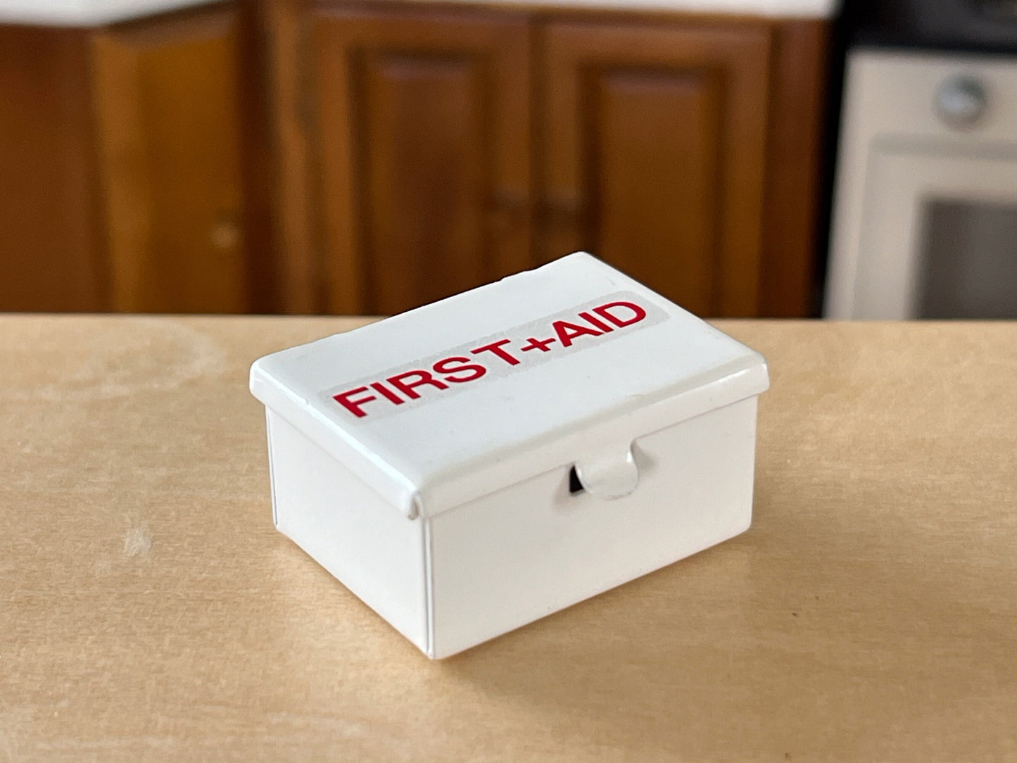 This 1:12 vintage miniature metal hinged red cross first aid kit is an exact replica of the lifelike ones, it is handcrafted to perfection and realistic in every detail. 
Size: 1" x 7/8" __etsy:6013958308