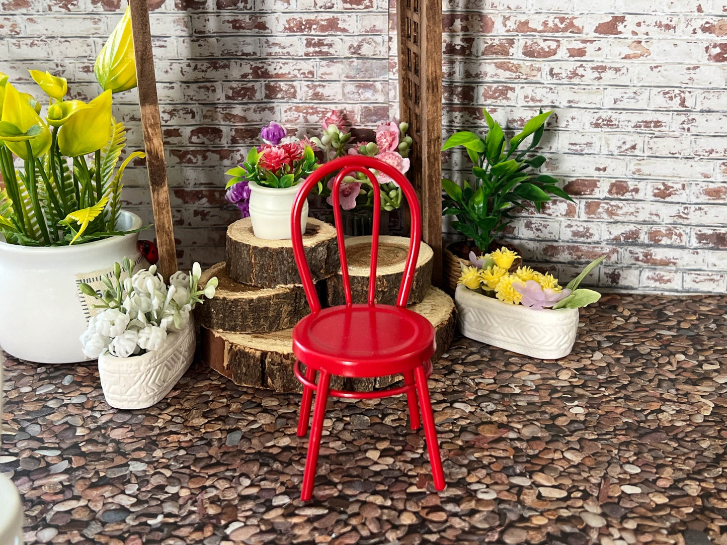 Finish the look of your dollhouse's patio or front porch with these adorable retro metal chairs. They come in a vibrant yellow, red, or white colors. The chairs are constructed of a strong metal and are very stable. __etsy:5916209063