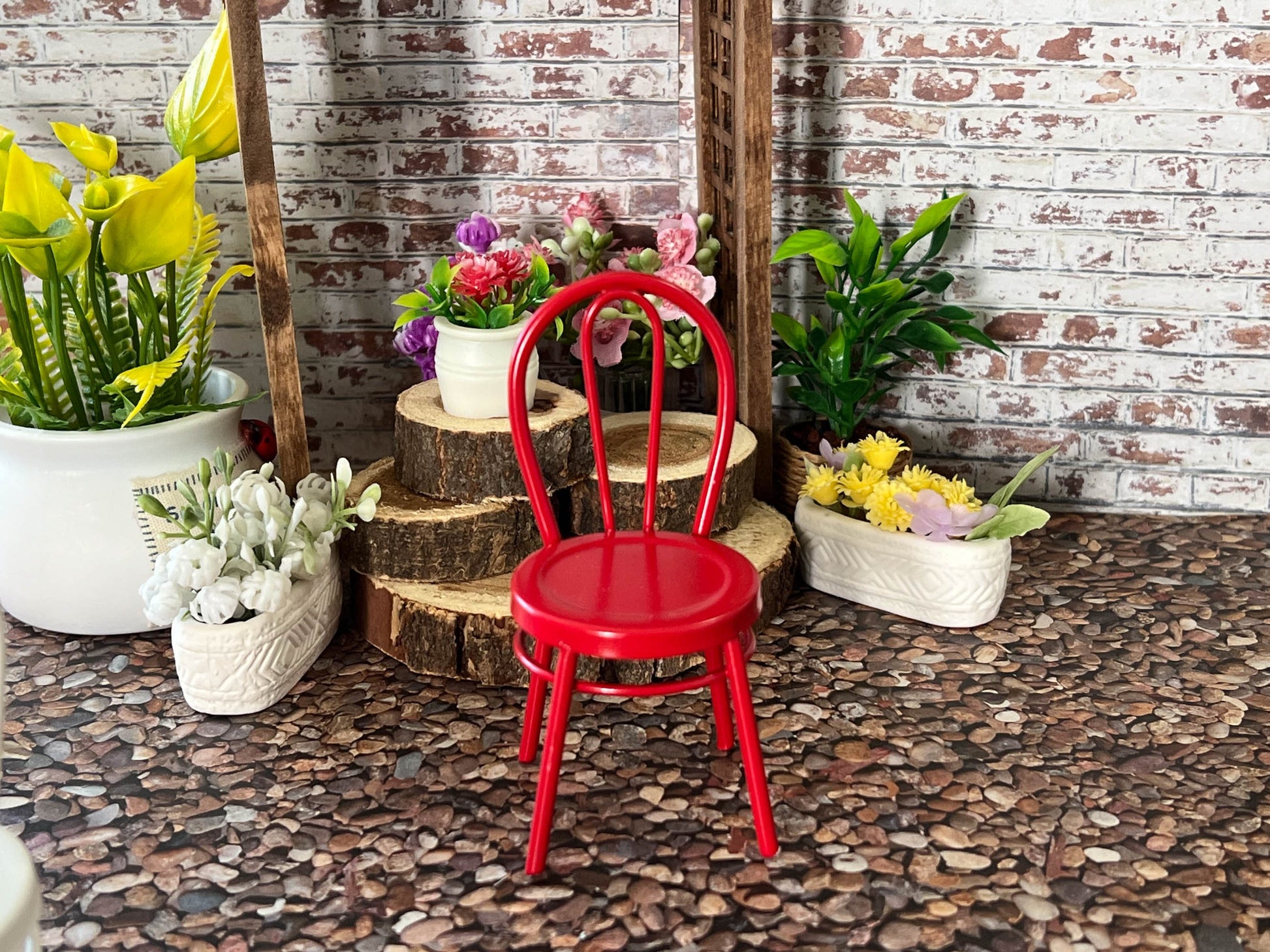 Finish the look of your dollhouse's patio or front porch with these adorable retro metal chairs. They come in a vibrant yellow, red, or white colors. The chairs are constructed of a strong metal and are very stable. __etsy:5916209063