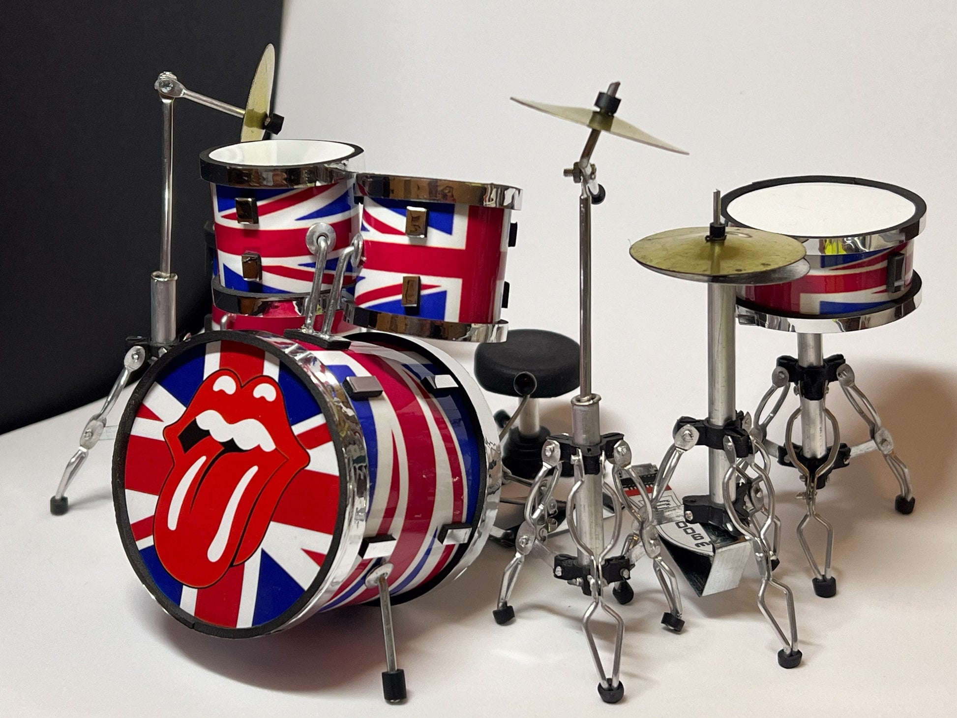 This astonishing Rolling Stone drum set is a collectibles item, this miniature precise replica drum set is a must have for any music lover. It is perfectly handcrafted in every detail. __etsy:5534924290
