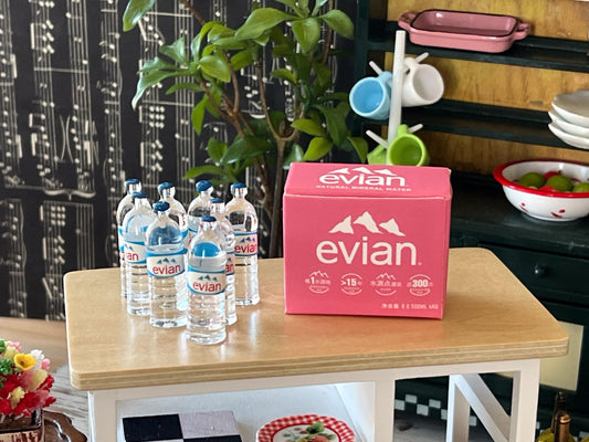 💧 Add a Refreshing Touch to Your Dollhouse Workout Room!
This adorable 1:12 scale set of 8 miniature water bottles, nestled in a charming cardboard box, is the perfect detail to bring life to your dollhouse scene. Expertly crafted in clear resin for a realistic look, these tiny water bottles are essential for your dollhouse workout room, bar, or lively get-together display. __etsy:6718530371