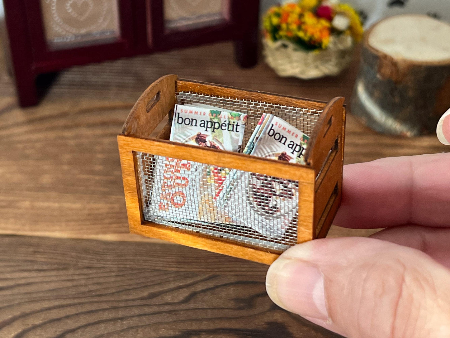 Dollhouse miniature high quality, well-made wooden storage basket, use it for just about anything, storage for the kitchen, living room magazines, anywhere any place. It is wood with a wire mesh in two sides and wood on both ends. 
Size: 44*27*17mm __etsy:6357686164