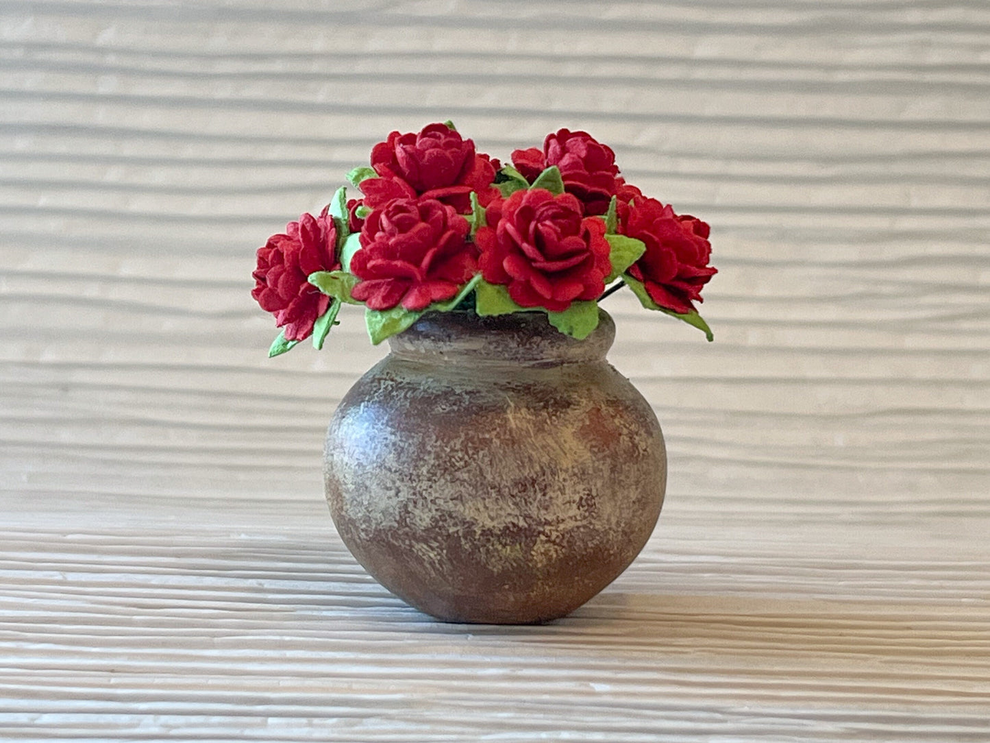 This adorable 1:6 scale terracotta vase has been white distressed and decorated with millinery red roses. Complete your dollhouse decor by placing this stylish vase by a front door, in your terrace. __etsy:5806919757