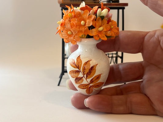 This miniature handcrafted white wood vase is handcrafted with decoupage paper and decorated with silk flowers.  This vase is lovely and takes time to make, so it is limited in quantities. __etsy:5476538594